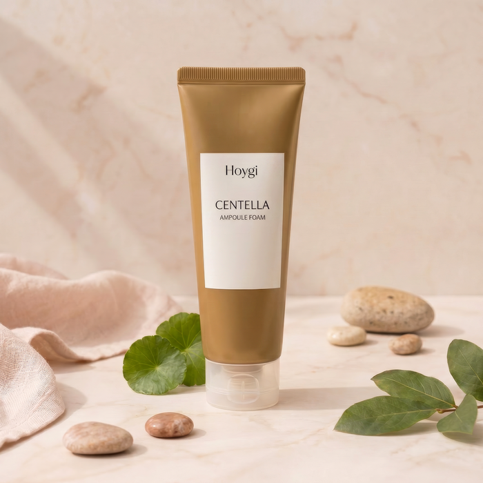 Hoygi Centella Ampoule Foam — limpiador facial en tubo dorado